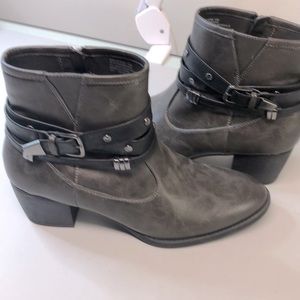 Excellent preowned brown boots with decorative buckle